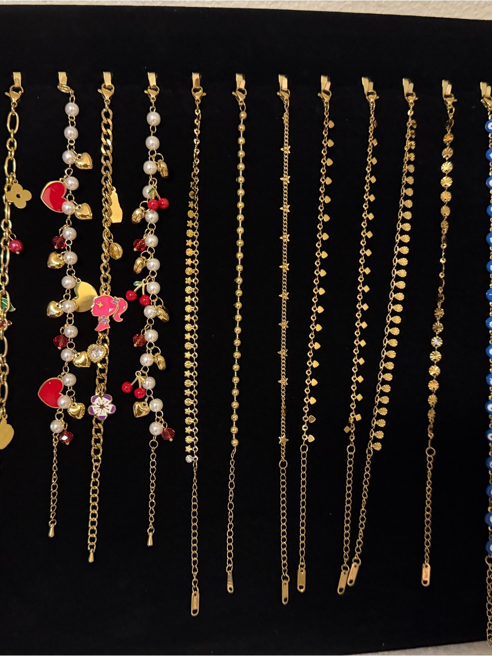Gold Tone Women's Charm Bracelet with Red and Pearl Accents
